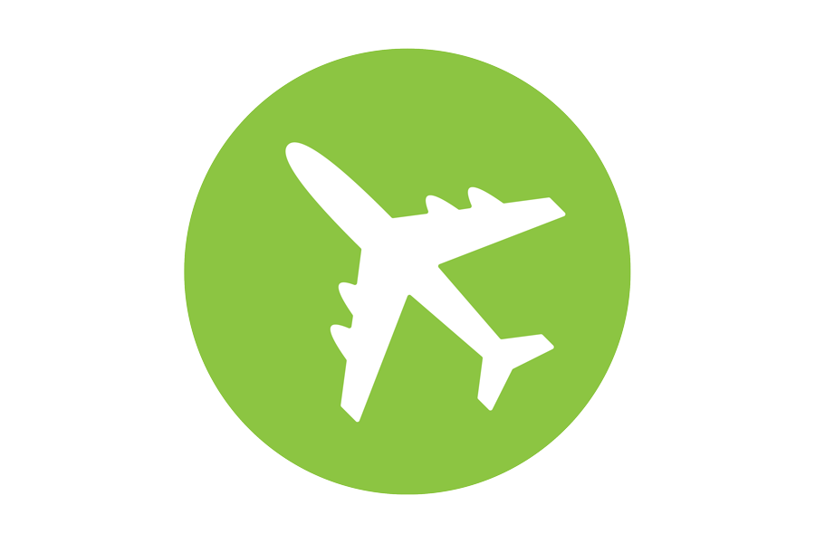 绿色背景上的白色飞机图标.